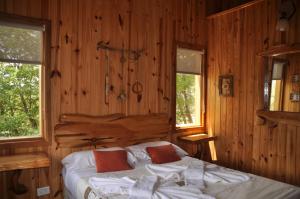 Ein Bett oder Betten in einem Zimmer der Unterkunft Parajes del lejano sur Cabaña El Patacón