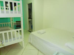 Cama o camas de una habitación en RAFAELLO HOTEL