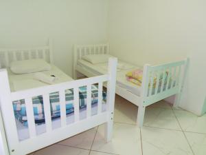 Cama o camas de una habitación en RAFAELLO HOTEL