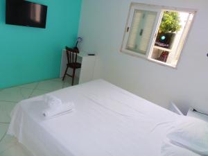 Cama o camas de una habitación en RAFAELLO HOTEL