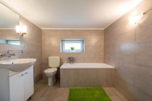 Koupelna v ubytování Corka Rybaka Apartments + 29 fotografií