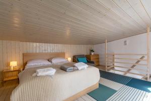 Postel nebo postele na pokoji v ubytování Corka Rybaka Apartments