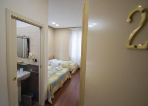 Casual Stay Cairoliにあるベッド