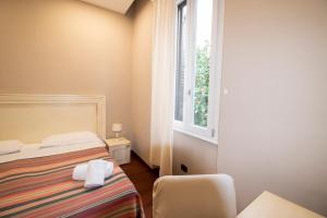 Casual Stay Cairoliにあるベッド