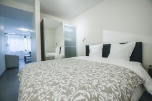 Postel nebo postele na pokoji v ubytování Il Mare appart hotel 1,2,4