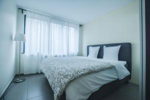 Postel nebo postele na pokoji v ubytování Il Mare appart hotel 1,2,4