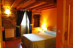 Ένα ή περισσότερα κρεβάτια σε δωμάτιο στο Rectoral de Prado