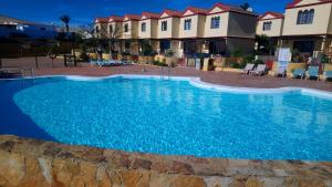 Bazén v ubytování Green Oasis by the pool nebo v jeho okolí