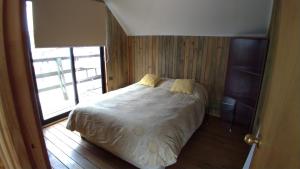 Cama ou camas em um quarto em CABAÑAS SAKAR