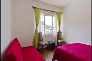 Cama ou camas em um quarto em Apartamento Valparaiso