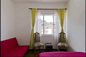 Uma área de estar em Apartamento Valparaiso