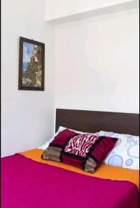 Cama ou camas em um quarto em Apartamento Valparaiso