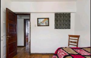 Cama ou camas em um quarto em Apartamento Valparaiso
