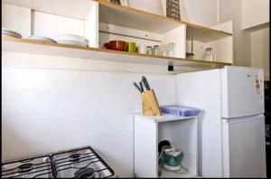 A cozinha ou cozinha compacta de Apartamento Valparaiso