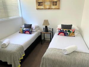 Ein Bett oder Betten in einem Zimmer der Unterkunft Canberra Short Term and Holiday Accommodation