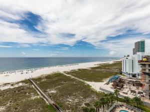 an aerial view of a beach with buildings and the ocean at Tidewater by Meyer Vacation Rentals in Orange Beach