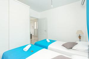 Postel nebo postele na pokoji v ubytování Villa belle lune