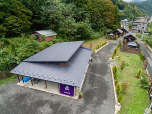 an overhead view of a house with a solar roof at SHIOYA SPA in Minakami