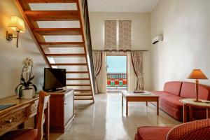 A television and/or entertainment centre at Mitsis Family Village