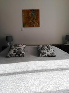 Posteľ alebo postele v izbe v ubytovaní Apartments Nina Riva