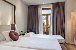 Posteľ alebo postele v izbe v ubytovaní Vincci Palace