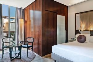 Posteľ alebo postele v izbe v ubytovaní Vincci Palace
