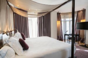 Posteľ alebo postele v izbe v ubytovaní Vincci Palace