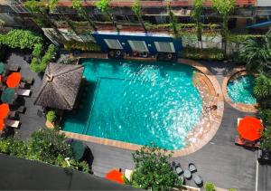 an overhead view of a swimming pool at a hotel at Sunbeam Hotel Pattaya - SHA Extra Plus in Pattaya