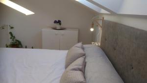 Łóżko lub łóżka w pokoju w obiekcie Casa FR VUT-OR-0345