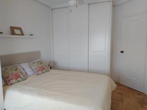 Łóżko lub łóżka w pokoju w obiekcie Casa FR VUT-OR-0345