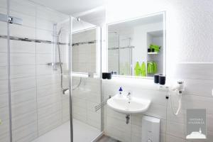 Koupelna v ubytování Gästehaus Schlossblick Greiz + 26 fotografií