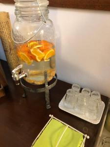 a glass jar filled with water on top of a table at B&B Casa Mila' in Pretoro