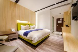 Voodi või voodid majutusasutuse Mucun Hot Spring Resort toas