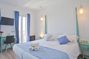 Posteľ alebo postele v izbe v ubytovaní Boutique Hotel Petit Sant Miquel