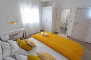 Postel nebo postele na pokoji v ubytování Villa DVORI