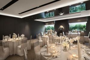 Ein Restaurant oder anderes Speiselokal in der Unterkunft The Sukhothai Bangkok 