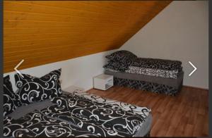 Postel nebo postele na pokoji v ubytování Apartmány Maruška