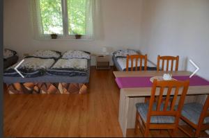 Postel nebo postele na pokoji v ubytování Apartmány Maruška
