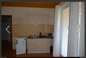 Kuchyň nebo kuchyňský kout v ubytování Apartmány Maruška