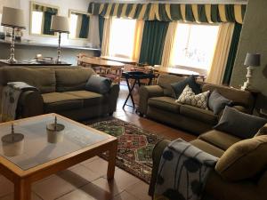 Χώρος καθιστικού στο Summerplace Holiday Home +15 φωτογραφίες