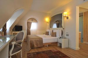 Postel nebo postele na pokoji v ubytování Hotel Yasmak Sultan