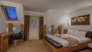 MER Guest House B&B客房内的一张或多张床位