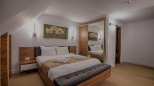 MER Guest House B&B客房内的一张或多张床位