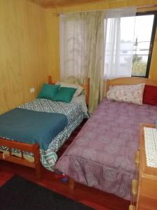 Uma cama ou camas num quarto em Casa Wengan