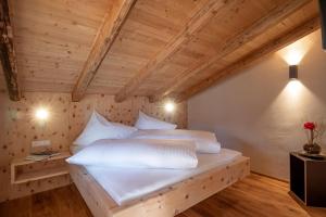 Łóżko lub łóżka w pokoju w obiekcie Apartments Zauberberg