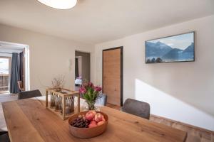 Telewizja i/lub zestaw kina domowego w obiekcie Apartments Zauberberg