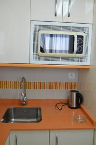 Kuchyň nebo kuchyňský kout v ubytování La Oca Levante Beach