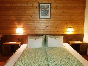 Krinserhof Easy-Roomsにあるベッド