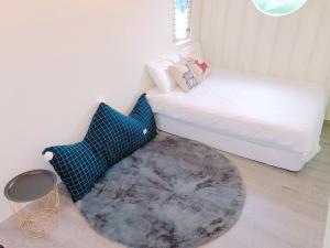 Postel nebo postele na pokoji v ubytování SHOW Liquiu B&B