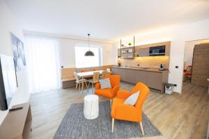 Kuchyňa alebo kuchynka v ubytovaní ALPRIMA Aparthotel Hinterstoder
